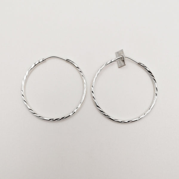 Argollas medianas diamantadas en plata 925