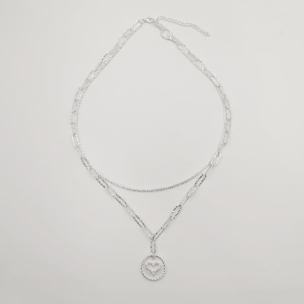 Collar doble con dije de corazón en plata 925