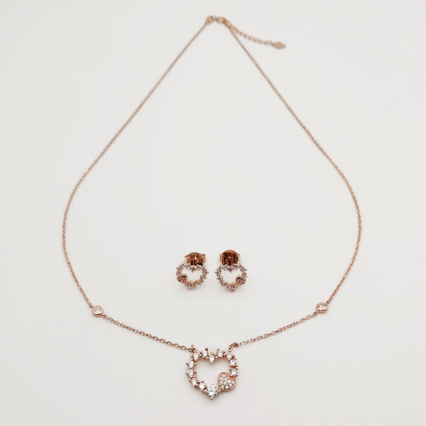 Juego de aretes & collar de corazón en plata 925 con baño de oro rosado 