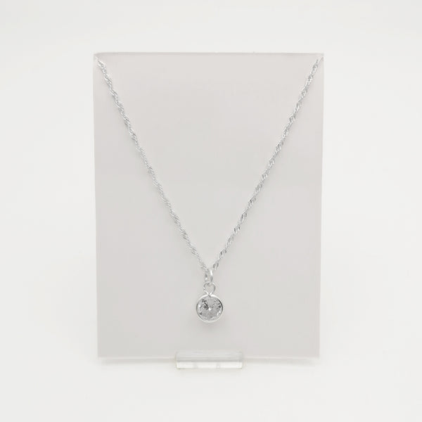 Cadena con mini dije punto de luz en plata 925