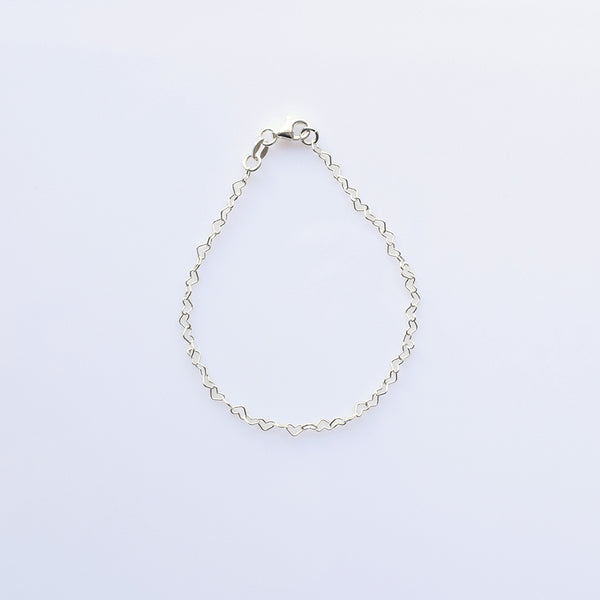 Pulsera tejido corazones en plata 925